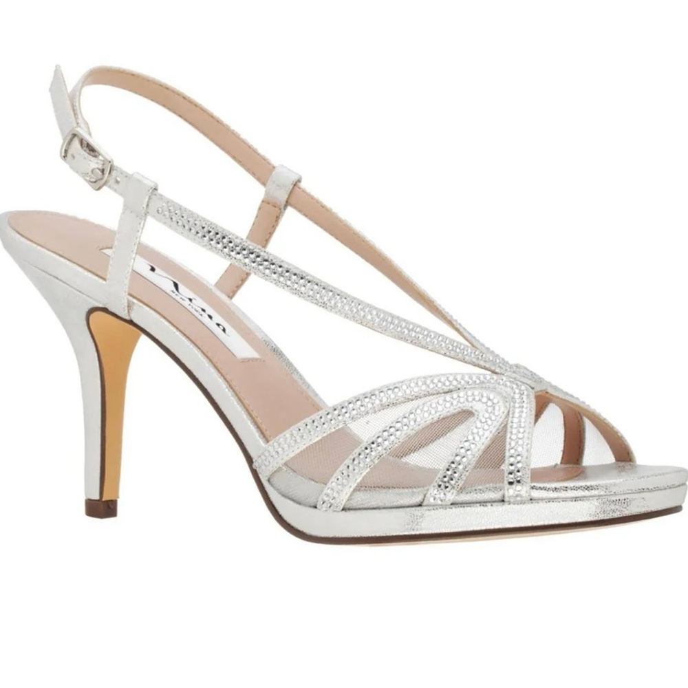 NIB.  Nina silver strappy sandals.  Super comfy too.